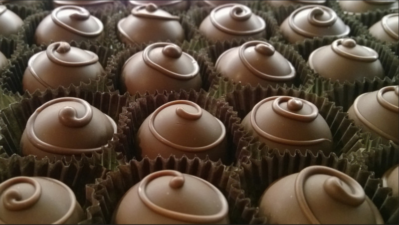 巧克力的原料可可豆，因生長困難受到氣候暖化強烈影響，預計在2050年可能面臨絕跡。   圖：翻攝自Flickr由LongitudeLatitude授權