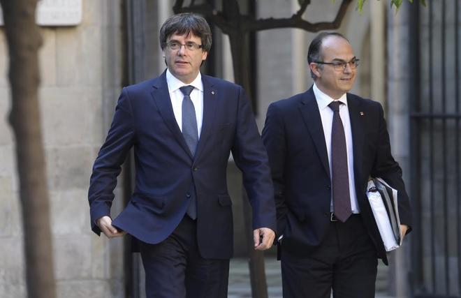 西班牙加泰隆尼亞區前主席普伊格蒙特（左）雖遭德國逮捕，但據傳受到良好待遇，在法庭上也能自我申辯。   圖：翻攝普伊格蒙特推特