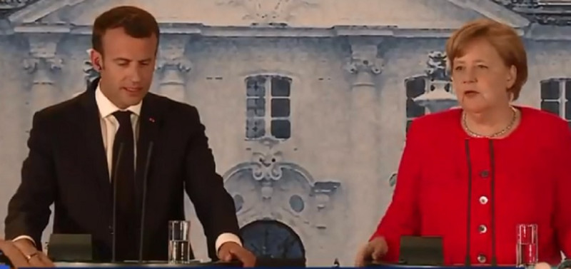 德國總理梅克爾19日與法國總統馬克宏會談，雙方同意設立歐元區的共同預算。   圖：翻攝BFMTV臉書