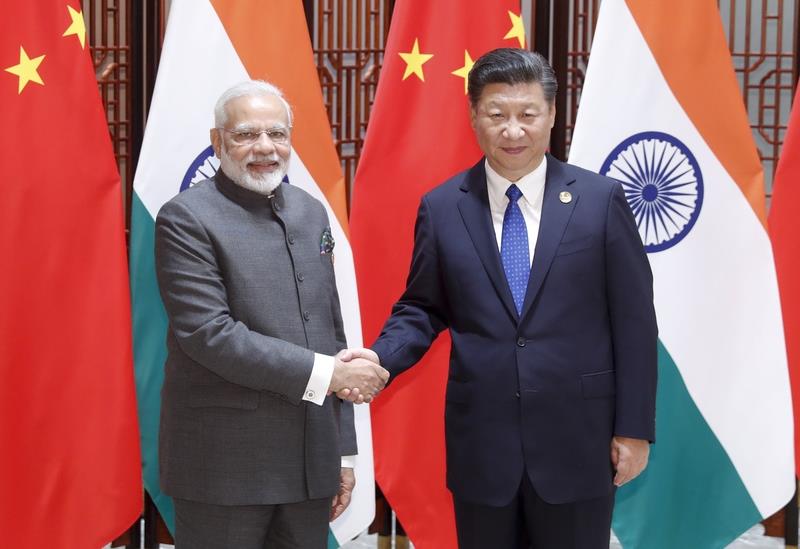 印度總理莫迪和中國國家主席習近平4月宣布要控管邊境摩擦，但消息人士說，8月以來，中國軍隊3度越線入侵領土。   圖：翻攝中新社官網