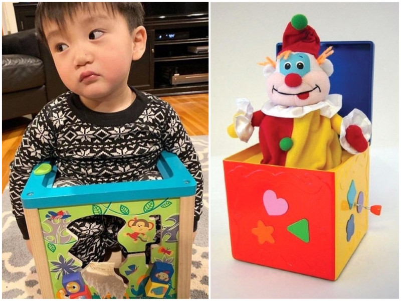 20 個月大的小男童被卡在玩具箱出不來，表情眼神死笑翻網友。   圖 / 攝自網路