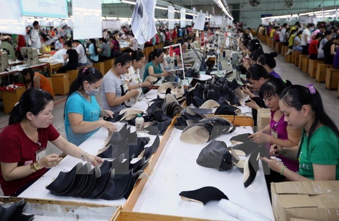 越南南部茶榮省台資公司美峰皮鞋宣布自2月開始裁員1萬142名員工，圖為越南榮省的工廠。   圖 : 翻攝自華人網