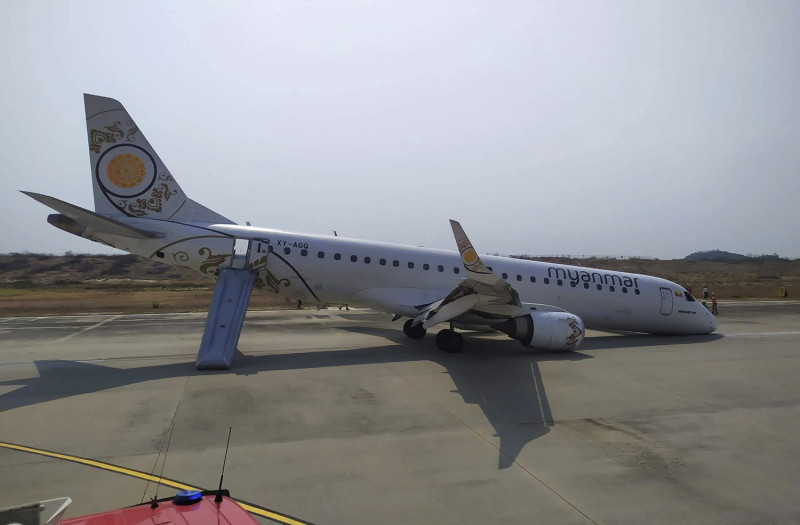 緬甸國家航空一架班機在12日因起落架故障，機師被迫用後輪與機鼻摩地降落。   圖：達志影像/美聯社