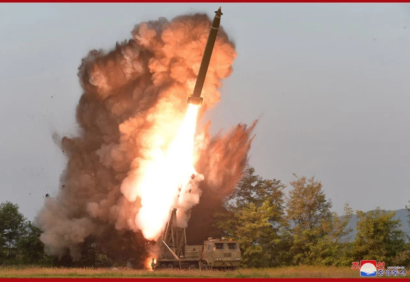 北韓試射火箭炮。   圖：翻攝自朝中社