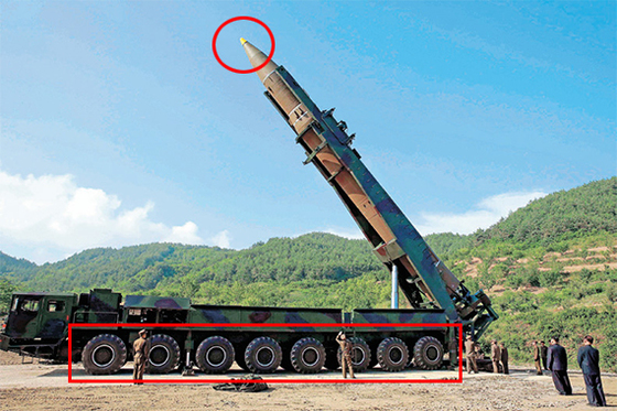 北韓8輛飛彈運輸起豎發射車(TEL)；圖為北韓火星-14型導彈。   圖 : 翻攝自勞動新聞