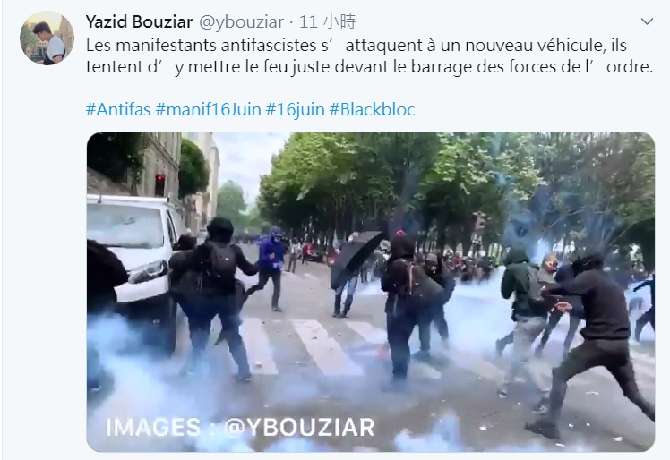 法國巴黎醫護遊行演變成暴力衝突，1名記者拍攝到戴著面具、黑色裝份的激進人士，不停向警方丟擲石塊。   圖：翻攝自 Yazid Bouziar推特