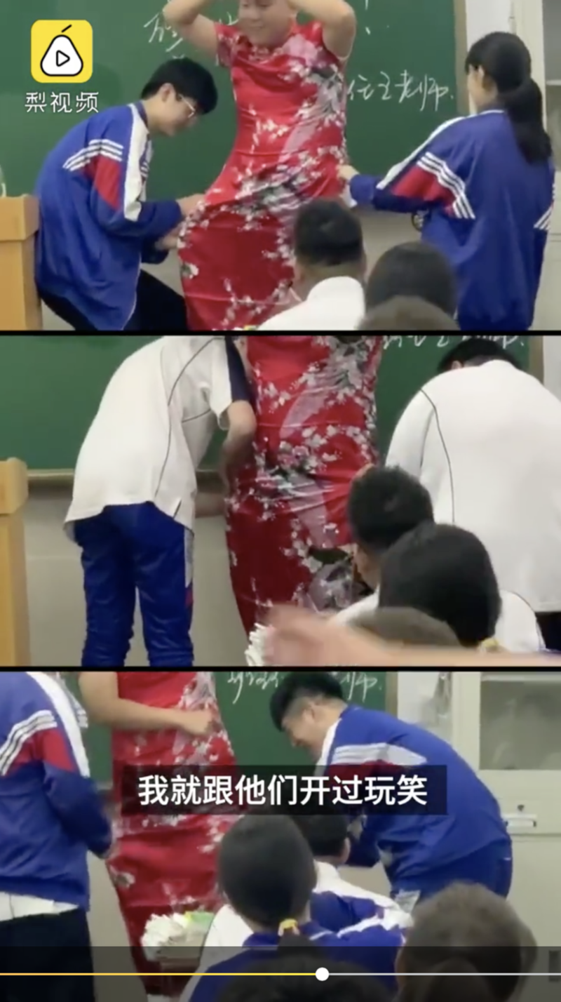 為了能降低考生壓力，遼寧丹東某校男班主任，穿上了大紅的旗袍走進教室，邀請孩子們一人在旗袍上剪一刀，意味著剪越高分數越高。   圖：擷取自梨視頻影片