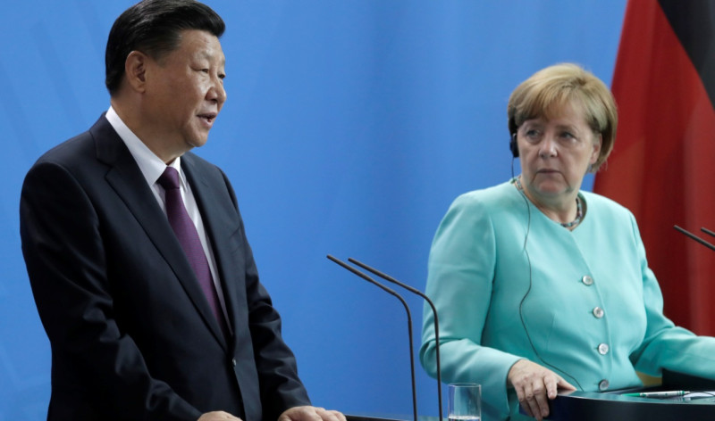 德國總理梅克爾與中國領導人習近平。   圖：達志影像/美聯社(資料照片)