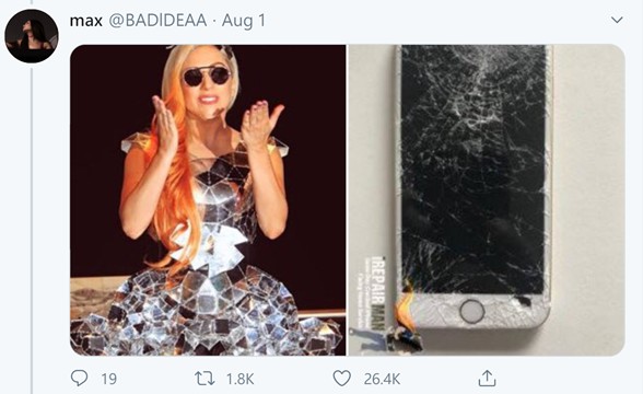 誇張的服裝造型連破裂的iPhone鏡面都能撞。   圖：翻攝自@BADIDEAA推特