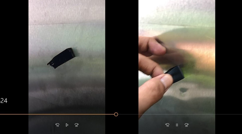 立委指新車車門破洞，台鐵局拍影片證明黑膠帶只是作為註記使用。   圖：台鐵局／提供
