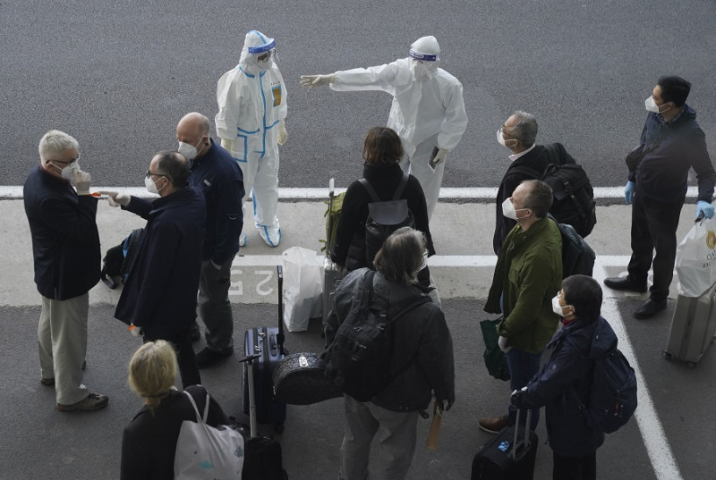 歷經一波三折，世界衛生組織（WHO）疫情調查專家今（14）日終於飛抵武漢。   圖：達志影像／美聯社