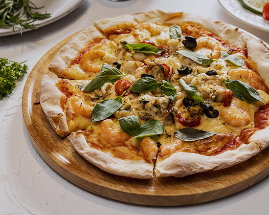 地中海風味海鮮披薩。   有義式餐廳/提供