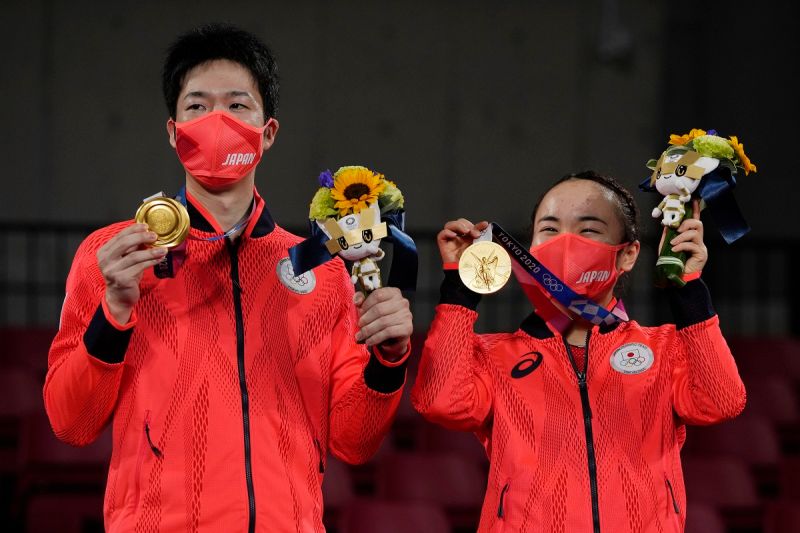 水谷隼/伊藤美誠幫助日本拿下奧運史上桌球項目首金。   圖／美聯社／達志影像