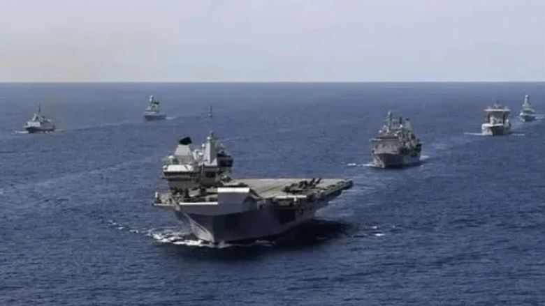 《騰訊網》指出，美國向英國航母群提出要求，衝進中國南海島礁12海里以內。   圖：翻攝自騰訊網
