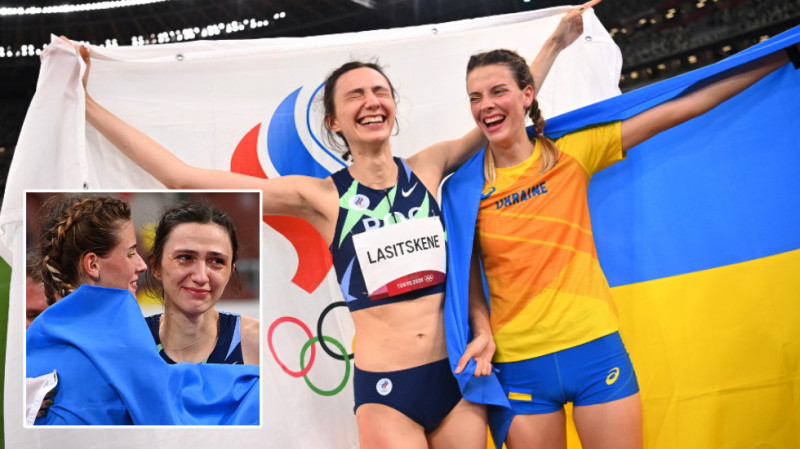 烏克蘭跳高選手雅羅斯拉娃·馬胡奇克（大圖右） 因在奧運賽場上擁抱俄羅斯跳高選手瑪麗亞·拉斯茲柯內（大圖左），而引起烏克蘭軍方與部分國內民眾的「憤怒反應」。   圖 : 翻攝自環球網