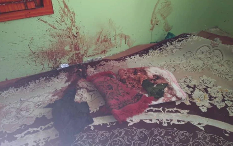 內加爾親屬提供的相片中可見房間內血濺牆面的景象。   圖：翻攝推特