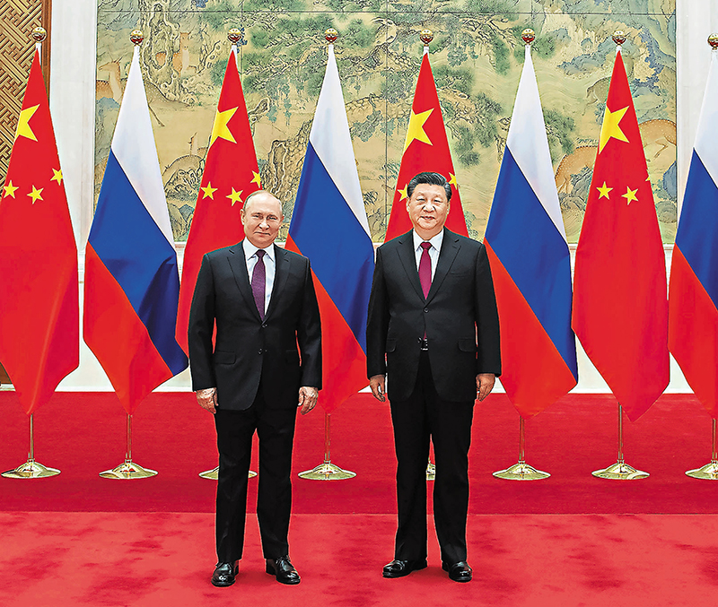 俄羅斯總統普丁（左）與中國國家主席習近平（右）於北京冬奧期間會面，並發布聯合聲明。   圖：翻攝自新華網