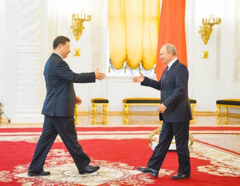俄羅斯總統普丁與中共領導人習近平 2022 年 12 月 30 日透過視訊會議會談，普丁在當時邀請習近平訪問莫斯科。   圖：翻攝新華網（資料照）