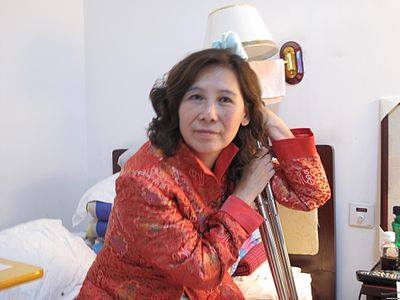 中國維權律師倪玉蘭(圖)，今年獲得美國國務院頒發的2016年「國際婦女勇氣獎」，卻遭中共以拒發護照等方式限制出境。   圖：翻攝自維基百科