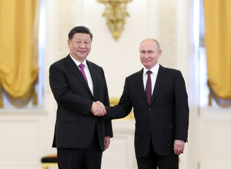 中國國家主席習近平（左）跟俄羅斯總統普丁（右）。圖：翻攝自中華人民共和國國防部（資料照）