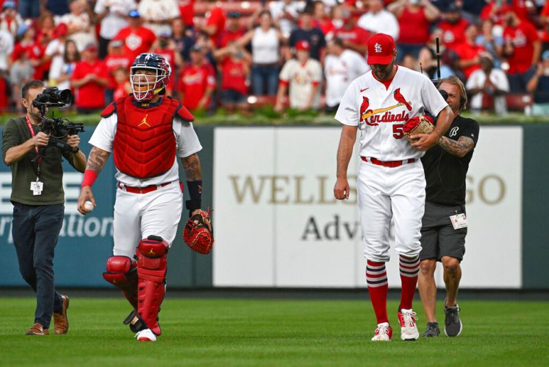 紅雀傳奇投捕Yadier Molina(左)、Adam Wainwright(右)打破聯盟紀錄。   圖／美聯社／達志影像