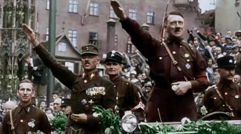 納粹禮和相關口號在戰後德國明例禁止，行納粹禮恐觸犯刑法。   圖：翻攝自youtube