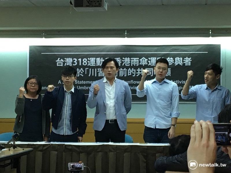 黃之峰、黃國昌、林飛帆、陳為廷共同舉行國際記者會，呼籲美方別把台灣當作與中國的談判籌碼，並且聲援李明哲。   圖：鍾孟軒/攝