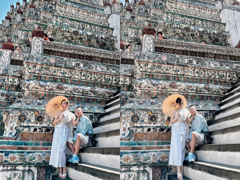 鳳梨與歐菈身穿泰國傳統服裝在泰國鄭王廟拍照。   圖：取自鳳梨 吳泓逸臉書