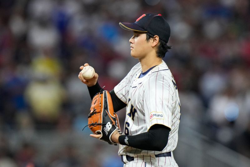 大谷翔平在萬眾矚目的對決中，用滑切球三振掉隊友Mike Trout。   圖／美聯社／達志影像