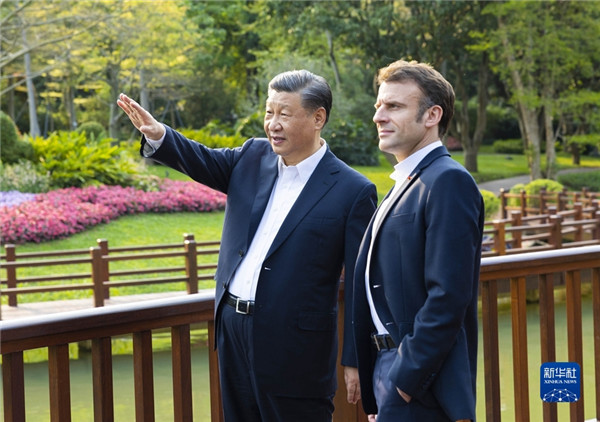 馬克宏(右)訪問中國期間受到習近平熱情款待。 圖：翻攝自中國外交部官網