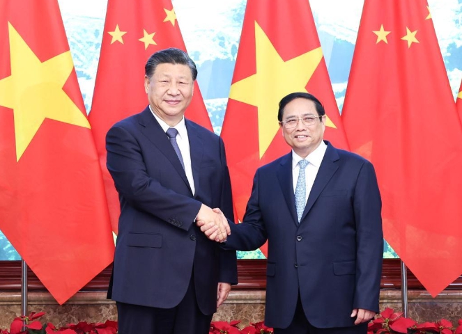 習近平在河內政府駐地會見越南總理范明政。 圖:翻攝自新華社