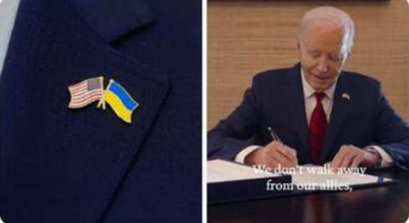 美國總統拜登在簽署援外法案時，還特別戴上有美國國旗與烏克蘭國旗的胸針，以表達對烏克蘭的支持。   圖 : 翻攝自白宮網站