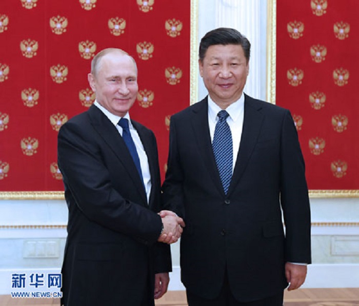 中國國家主席習近平3日在莫斯科克里姆林宮會見俄羅斯總統普亭，雙方就朝鮮半島議題達成共識。   圖：翻攝新華網