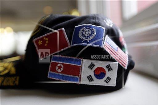 韓戰結束60多年   一頂繡有南北韓和中美國旗及聯合國旗幟的帽子   圖：達志影像／美聯社