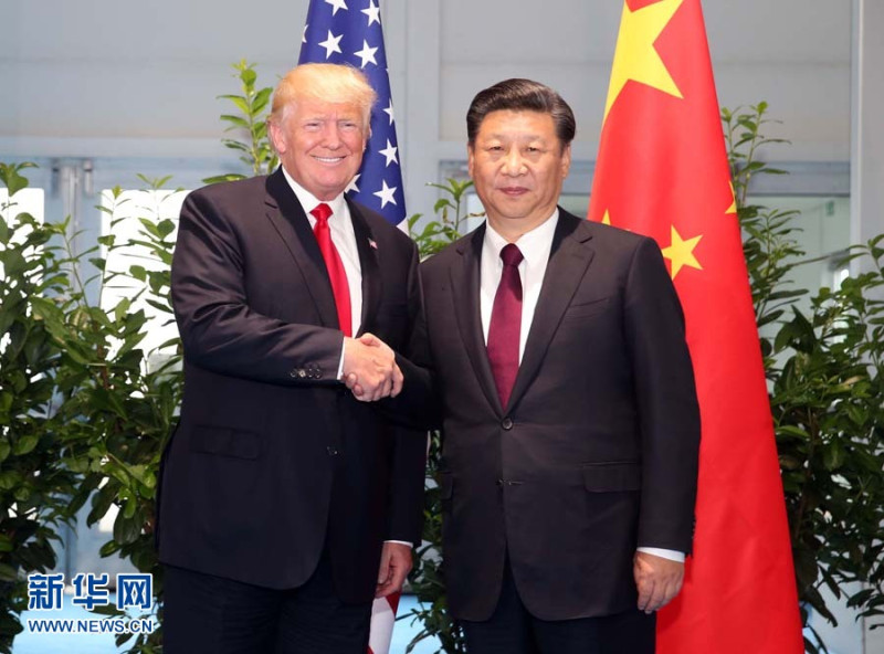 中國國家主席習近平與美國總統川普在G20峰會上握手合照。   圖：翻攝新華社