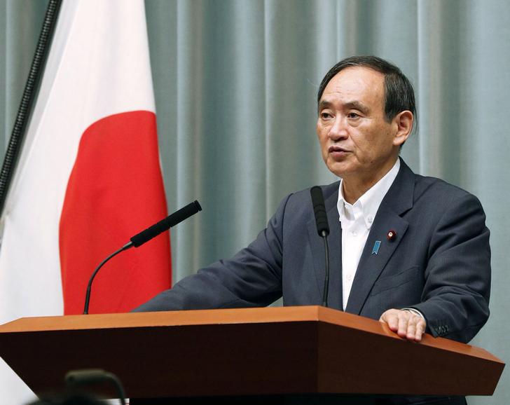 日本內閣官房長官菅義偉對北韓飛彈試射表示看法。   圖：達志影像/路透社