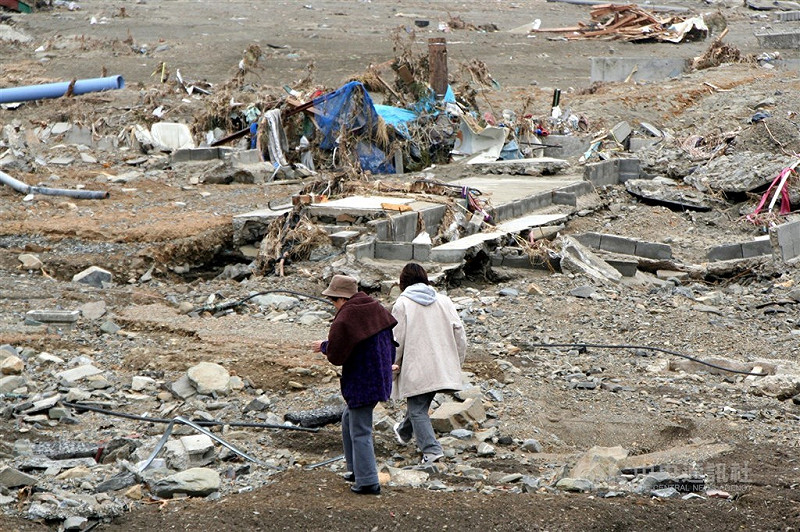 2011年3月11日日本規模9.1強震，宮城縣南三陸町志津川地區被海嘯摧毀。（中央社檔案照片）   圖：中央社提供