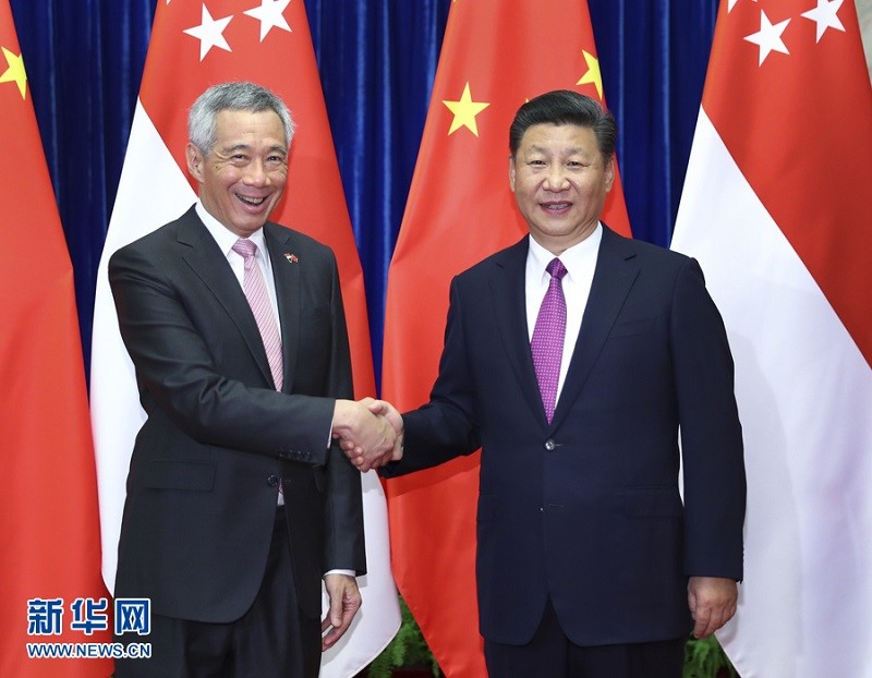 根據新加坡官方發布的新聞稿，李顯龍與習近平會面時僅重申遵循「一個中國」政策，並未提到反台獨。   圖：翻攝新華網
