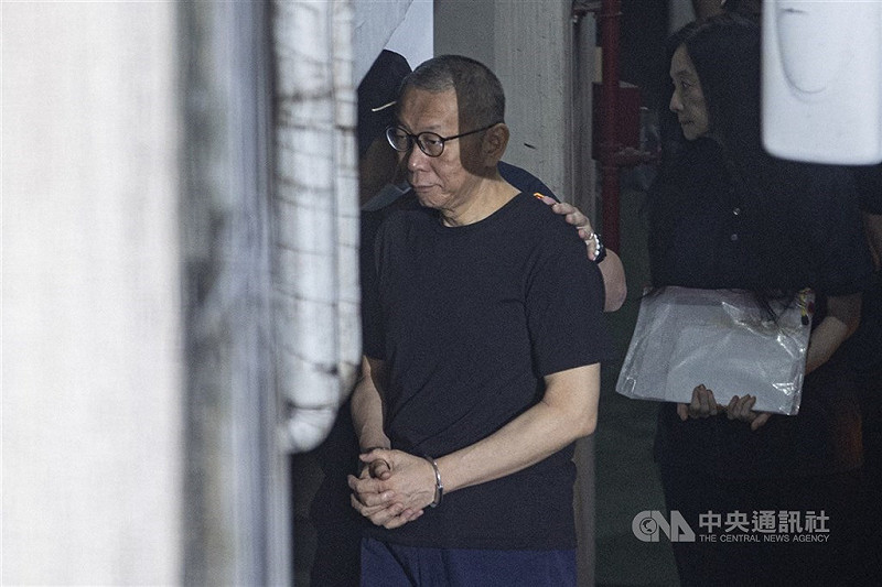中為前台北市長柯文哲。   圖:中央社提供(檔案照片）