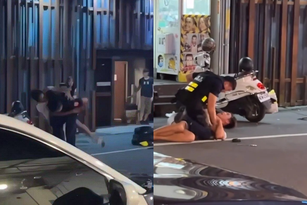 南投埔里晚間有2名酒客爆發衝突，巡邏員警勸阻未果，以過肩摔與大外割制伏2人，獲全網大讚。   圖：翻攝自爆料公社