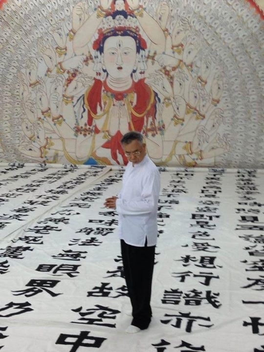 洪啟嵩是國際知名佛教藝術家。圖：翻攝自覺性地球協會臉書   