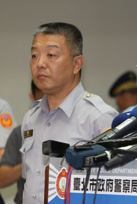 台北市警察局信義分局長李德威8日遞出退休申請，他的妻子也向消防局申請退休。圖：中央社資料照片   