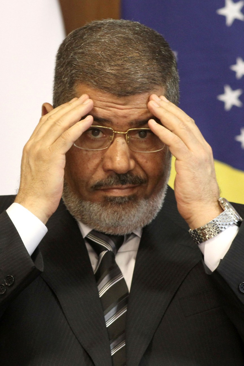 埃及總統穆西(Mohammed Morsi)26日夜晚於開羅發表演說認錯。圖片來源：達志影像/美聯社。   