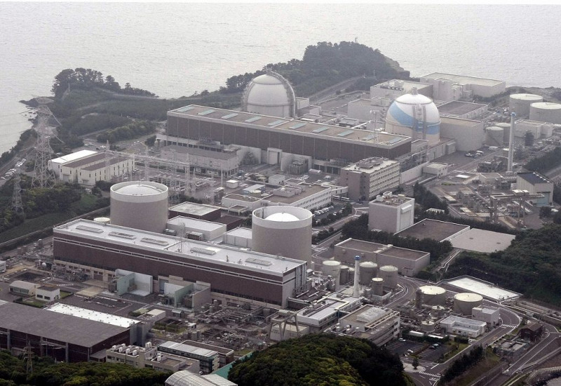 位在日本佐賀縣玄海町的九州電力玄海核電廠2、3號反應爐是否重啟，則有待壓力測試結果。圖為玄海核電廠。圖片來源：達志影像/路透社。   