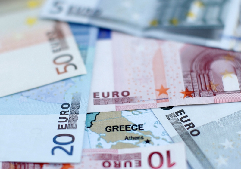 歐元區各國財政部長在布魯塞爾召開會議討論希臘債務問題，將要求持有希臘債券的民間銀行「大幅增加」認賠幅度。據最新的報告顯示，銀行減債幅度恐怕高達60%。圖片來源：達志影像/路透社   