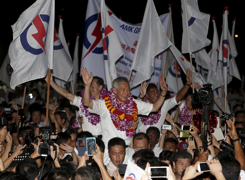 新加坡11日舉行第17屆國會選舉，李顯龍領導的人民行動黨（PAP）最後仍贏得大選，繼續執政。圖片來源：達志影像/路透社   