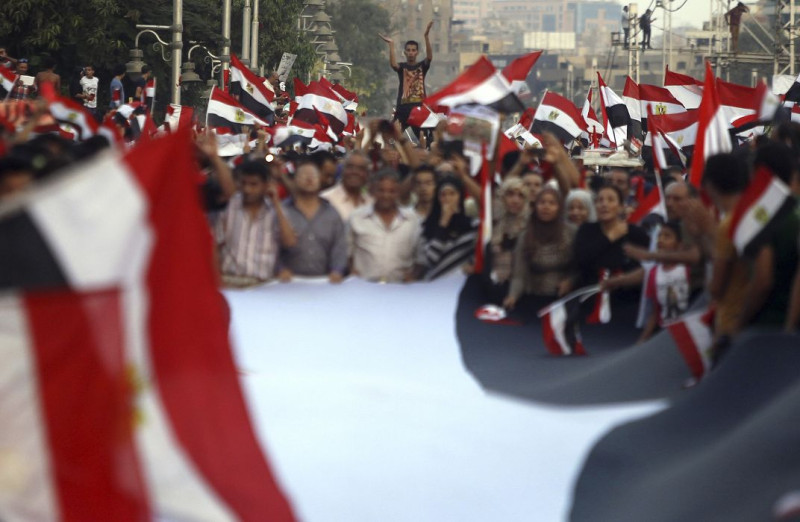 埃及示威遊行越演越烈，至今全國已有超過1400萬民眾上街要求總統穆希下台。圖片來源：達志影像/路透社。   