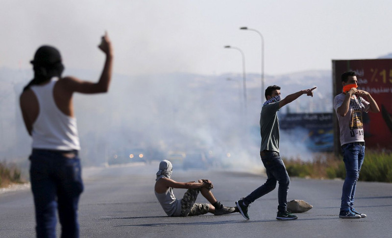 以色列西岸屯墾區極端份子7月31日縱火害死1名巴勒斯坦1歲大嬰兒，引發巴勒斯坦人的抗議。圖片來源：達志影像/路透社   