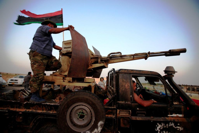 聯合國在美東時間周五(16日）以114票贊成通過承認利比亞反抗軍政權，並認定該利比亞政權在國際間擁有一席之地。圖為利比亞反抗軍之前攻陷首路都的照片。圖片來源：達志影像/路透社   