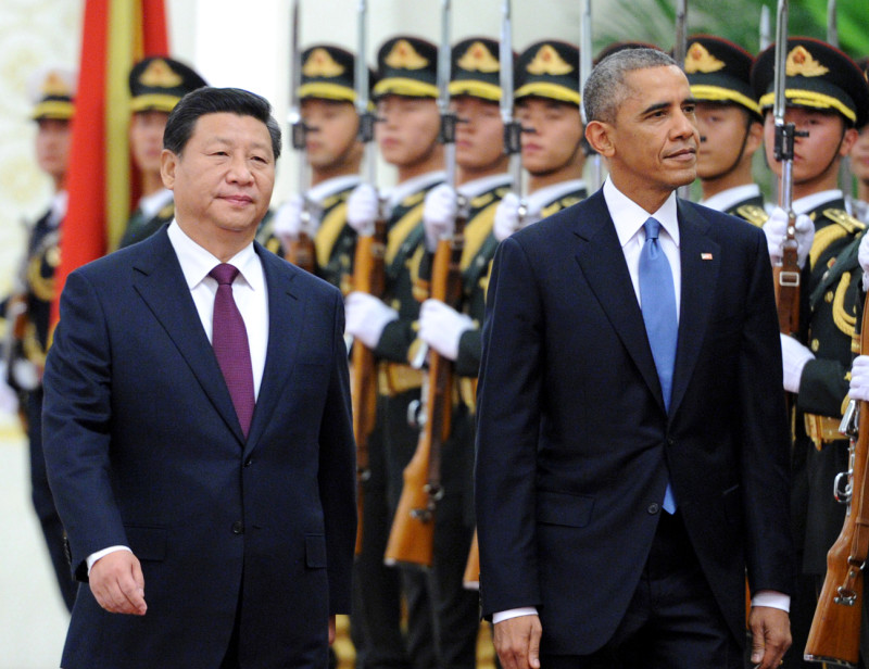 美國總統歐巴馬（右）打出「重返亞洲」口號，對上中國國家主席習近平（左）追求世界第一的野心，專家籲美國有必要調整對中戰略。圖片來源：達志影像/美聯社   